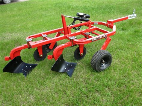 00 Brinly-Hardy 17 cu. . Pull behind plow for lawn tractor